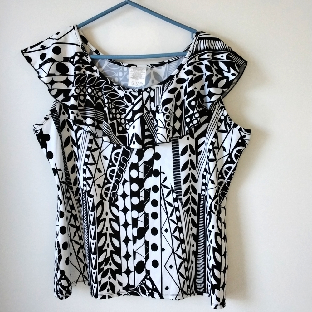 Ladies black and white ruffled top